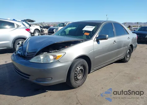 2002 Toyota Camry Le from USA, damaged, VIN 4T1BE32K72U609314